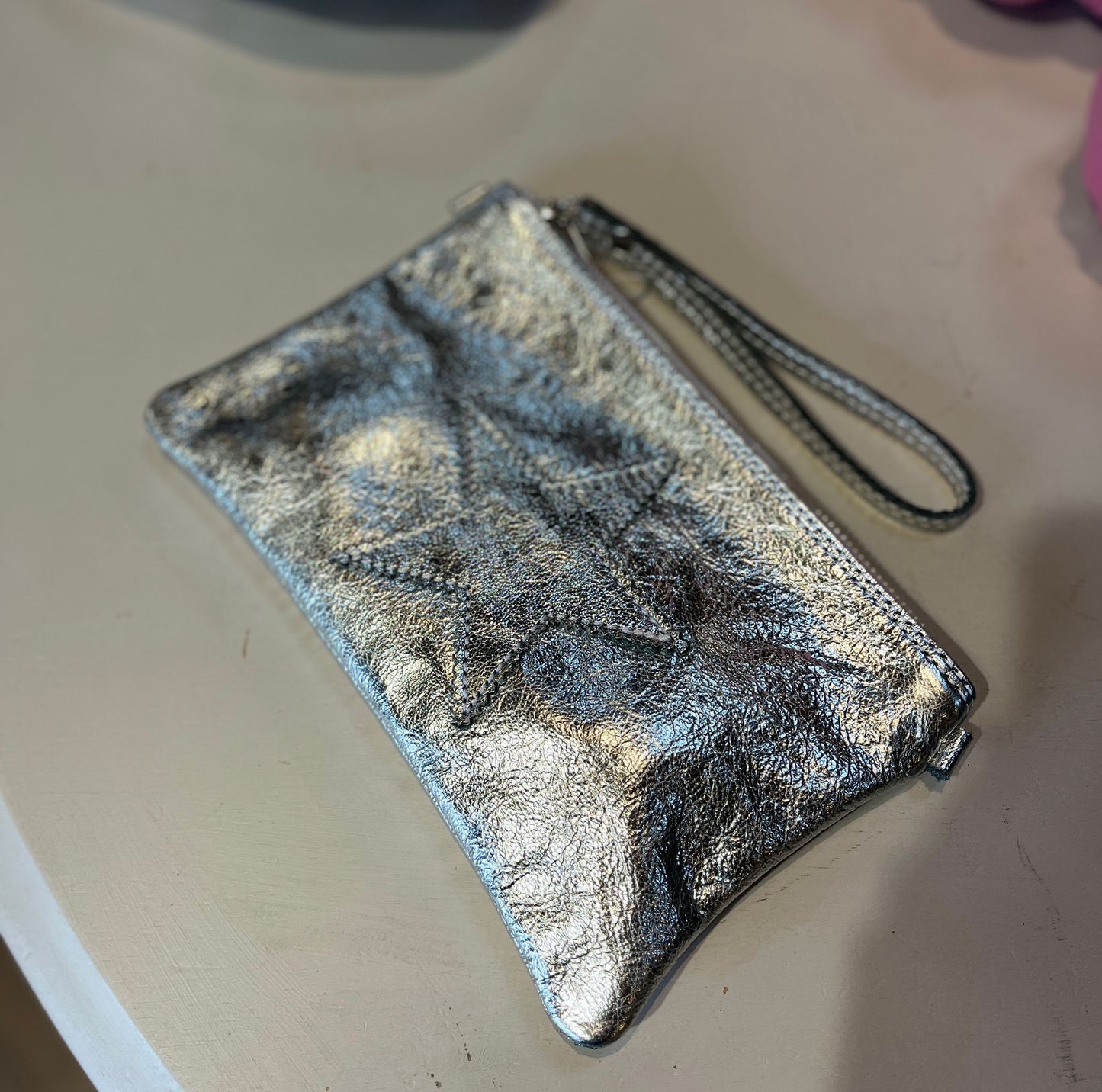 Leather star clutch bag
