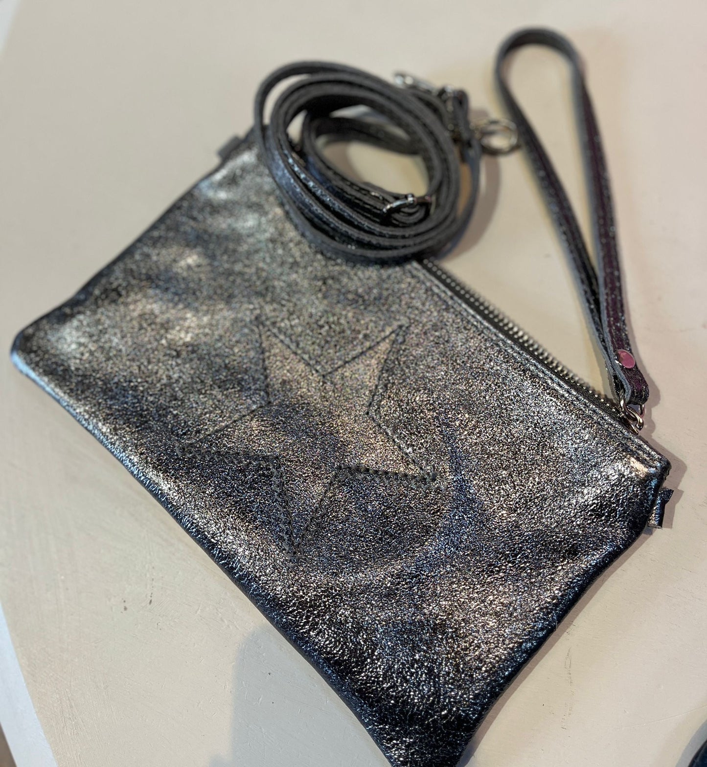 Leather star clutch bag